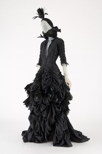 NORMA KAMALI, black parachute cloth and feather jacket, skirt, and turban, 2011, USA, Photograph MFIT / CFDA